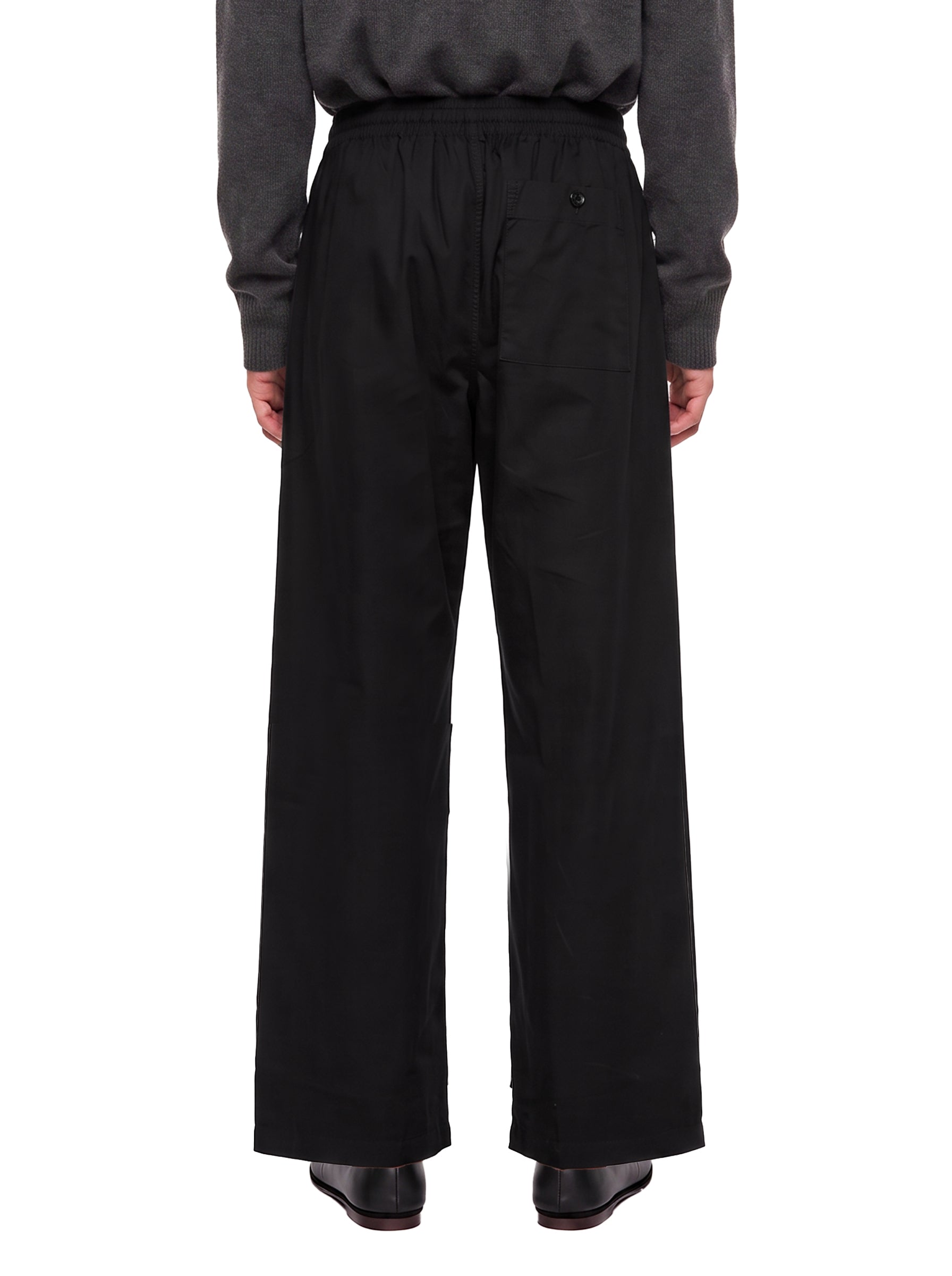 Pantaloni a gamba ampia con coulisse in nero 