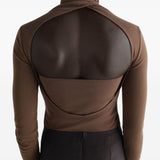 Top semi-trasparente con foulard in beige 