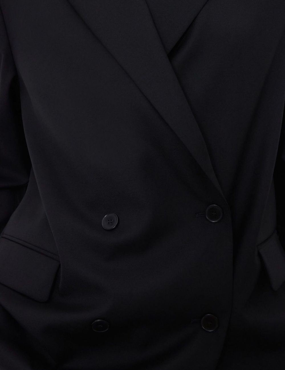 Blazer doppiopetto con revers a lancia in nero 