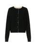 Cardigan nicola con bordi a contrasto in nero