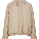 Giacca con tasche in beige 