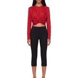 Top a maniche lunghe con nodo in rosso 