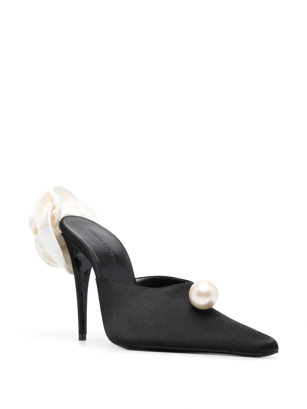 Mules con dettaglio a fiore in nero 