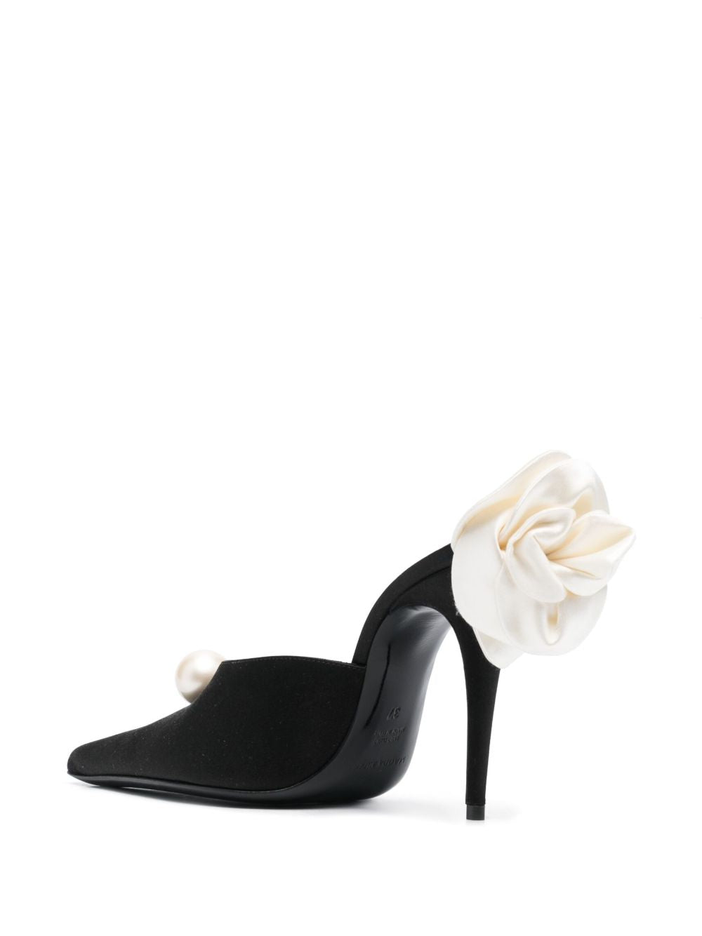 Mules con dettaglio a fiore in nero 