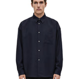 Camicia con taschino in blu 