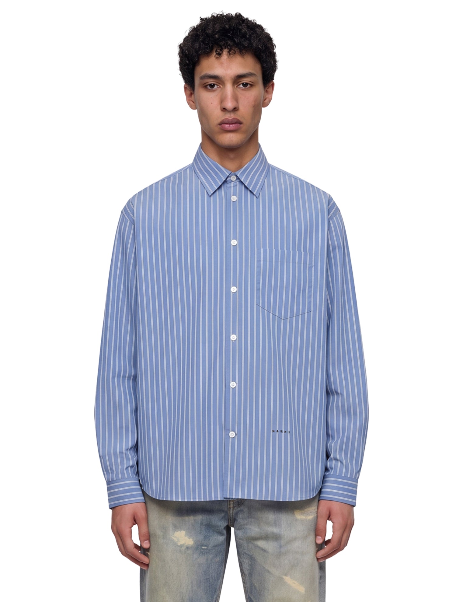 Camicia a righe in celeste 