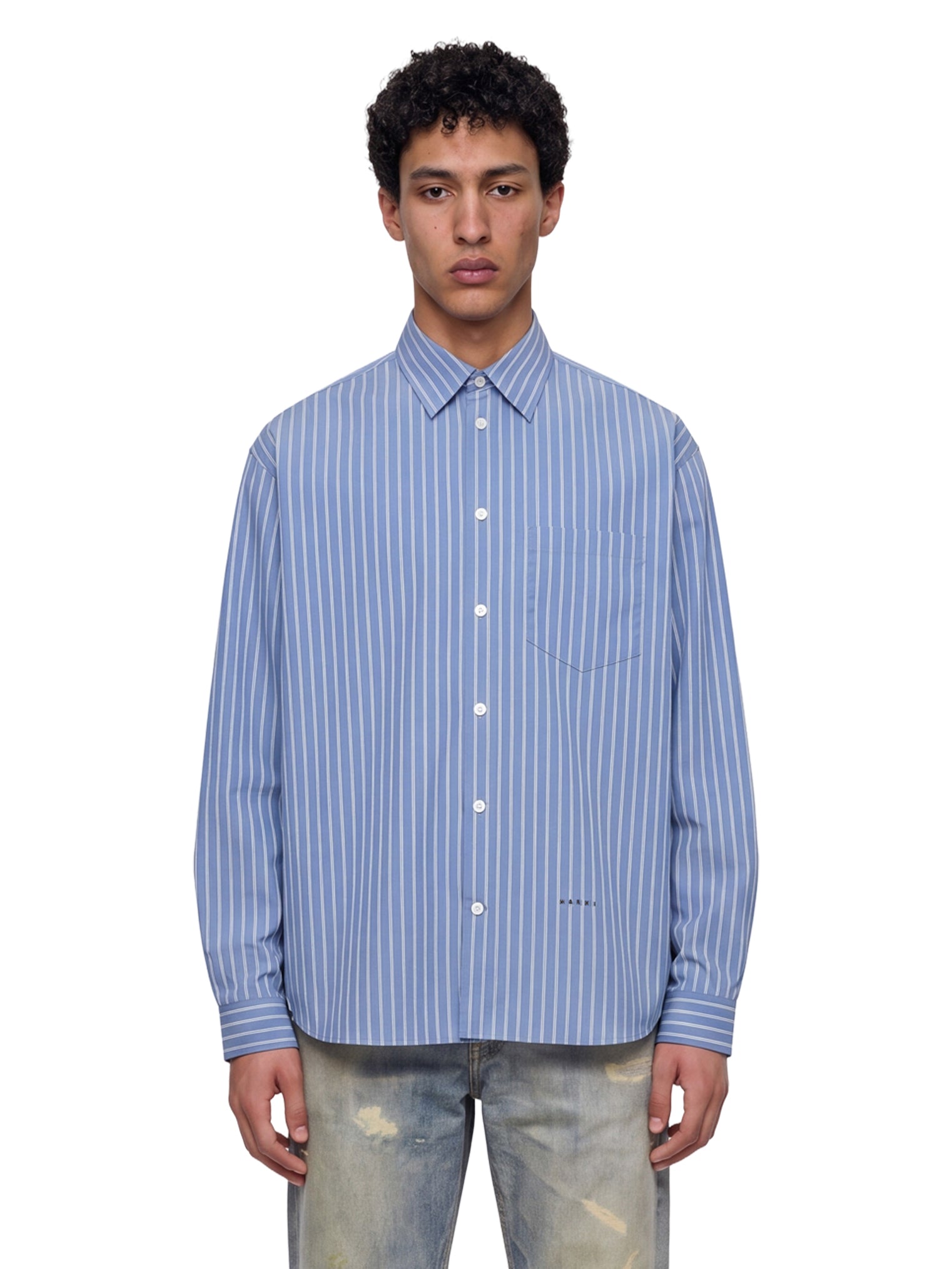 Camicia a righe in celeste 