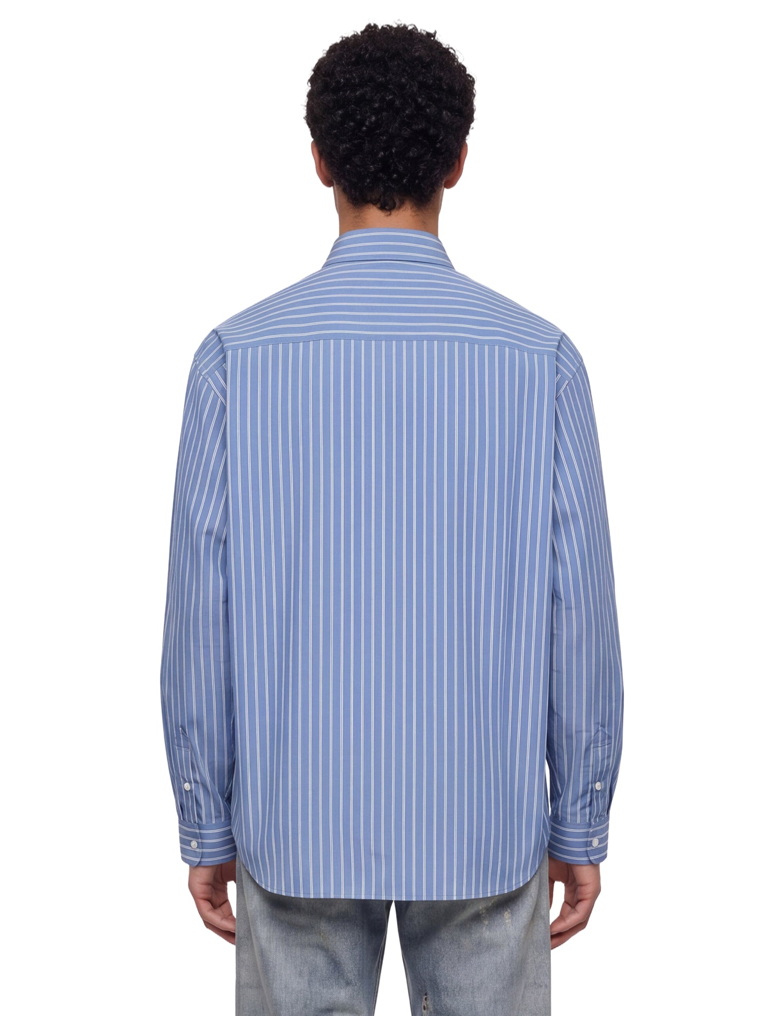 Camicia a righe in celeste 