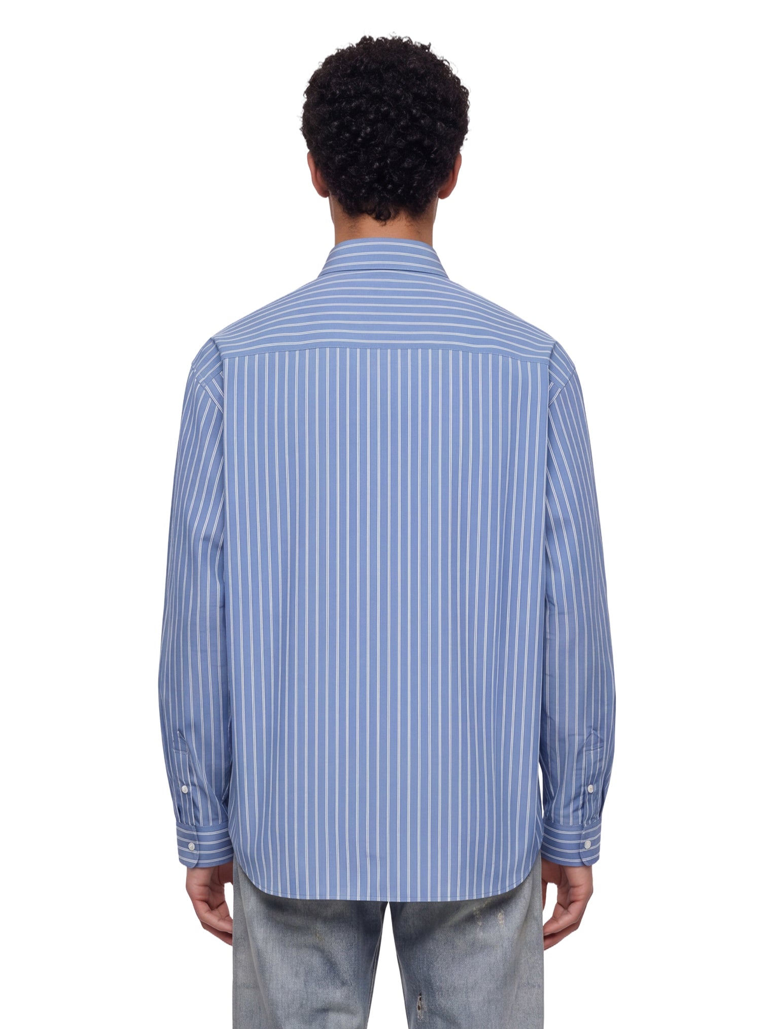 Camicia a righe in celeste 