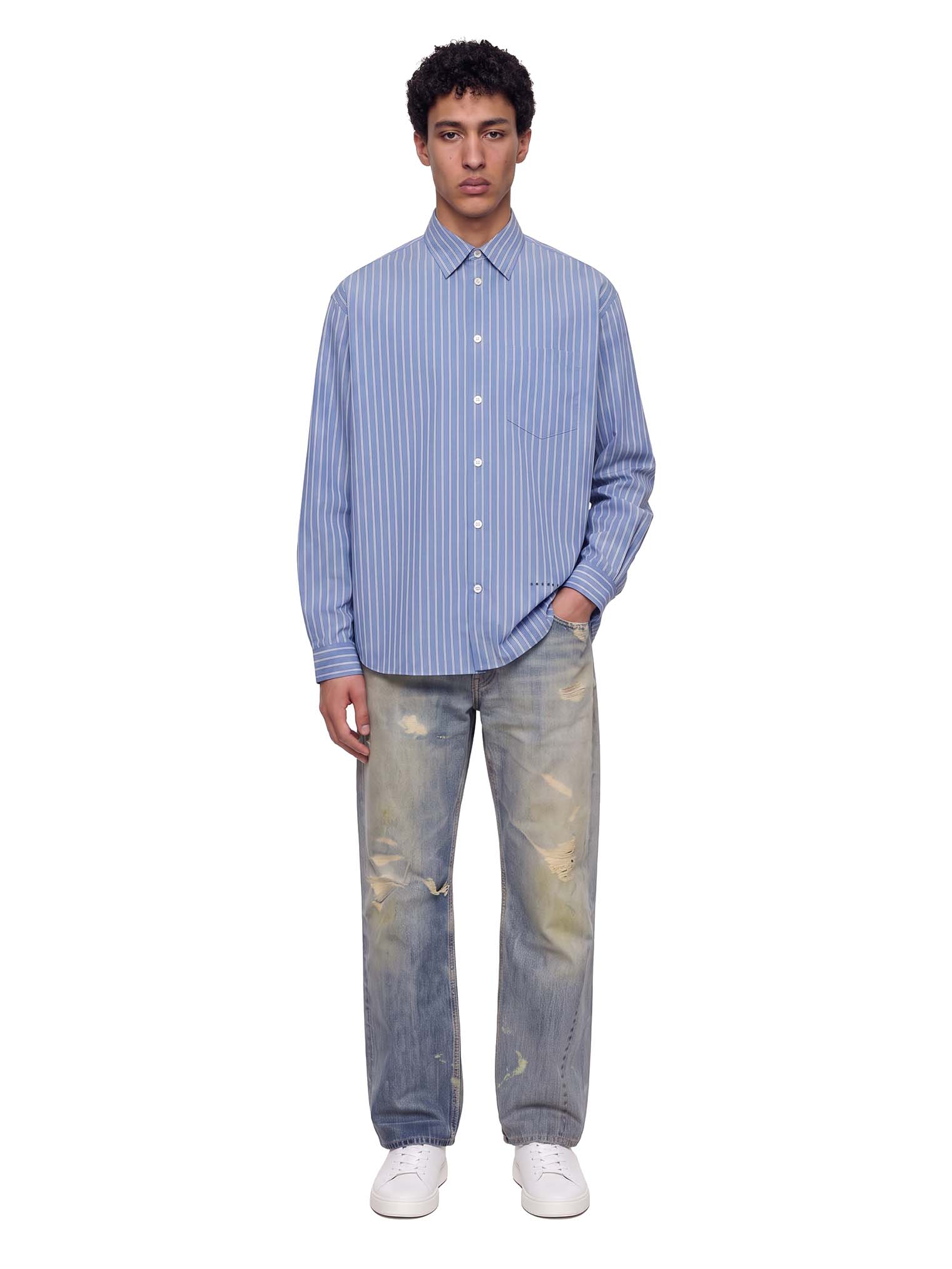 Camicia a righe in celeste 
