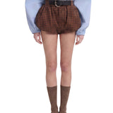 Shorts a quadri in marrone 