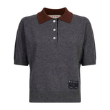 Polo in cashmere grigio con colletto a contrasto 