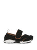 Sneakers in shearling in nero