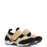 Sneakers in shearling bicolore in beige e nero 