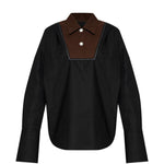 Camicia con inserti a contrasto in nero 