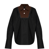 Camicia con inserti a contrasto in nero 