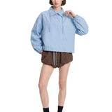 Camicia in popeline a collo alto in celeste 