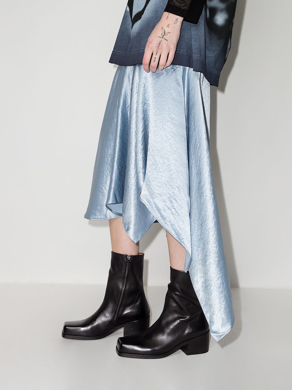 Stivaletti con tacco in pelle in nero 