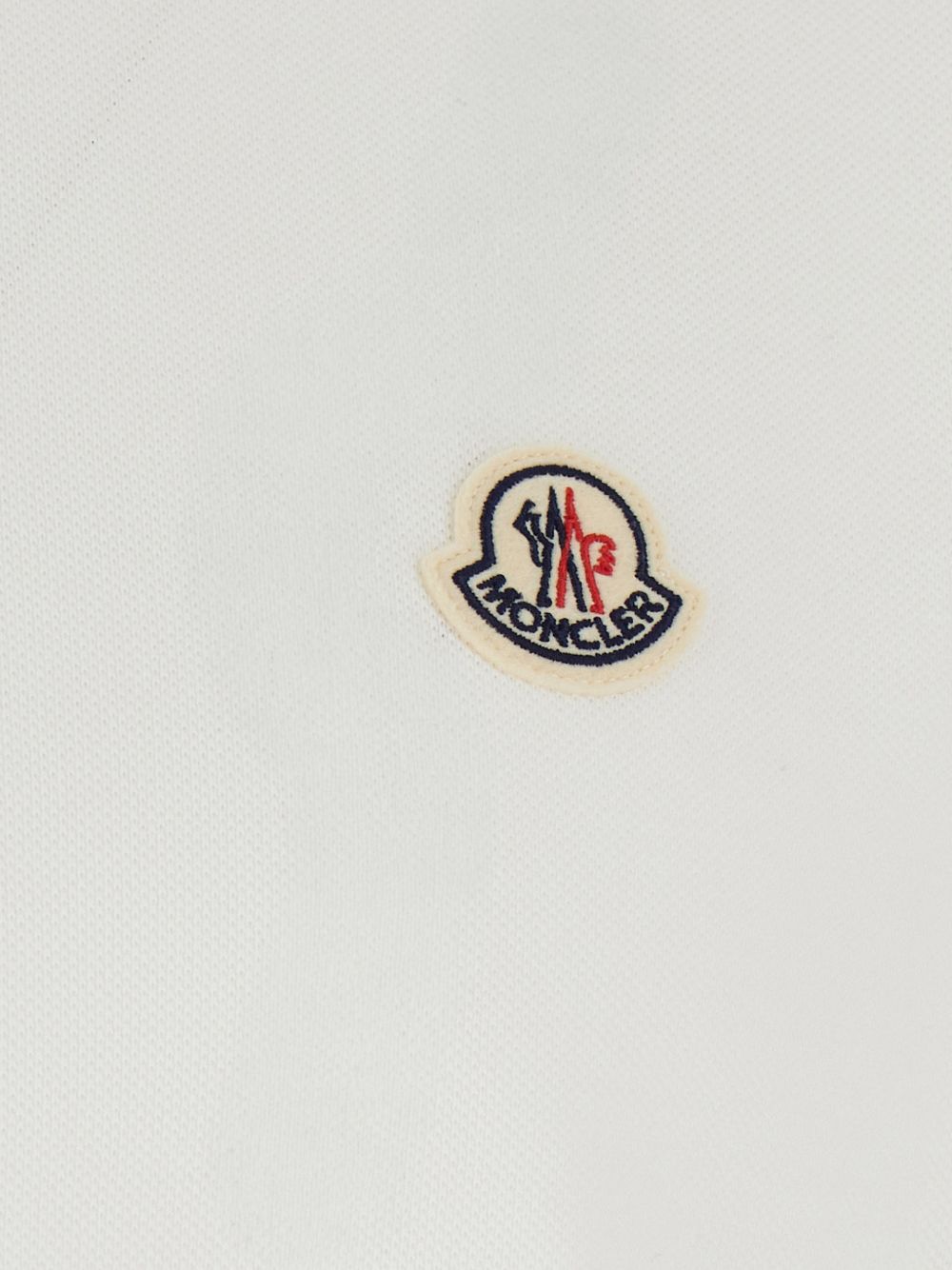 Polo con logo in bianco 