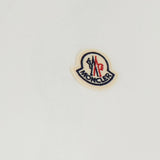 Polo con logo in bianco 