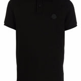 Polo con logo in nero 