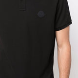 Polo con logo in nero 