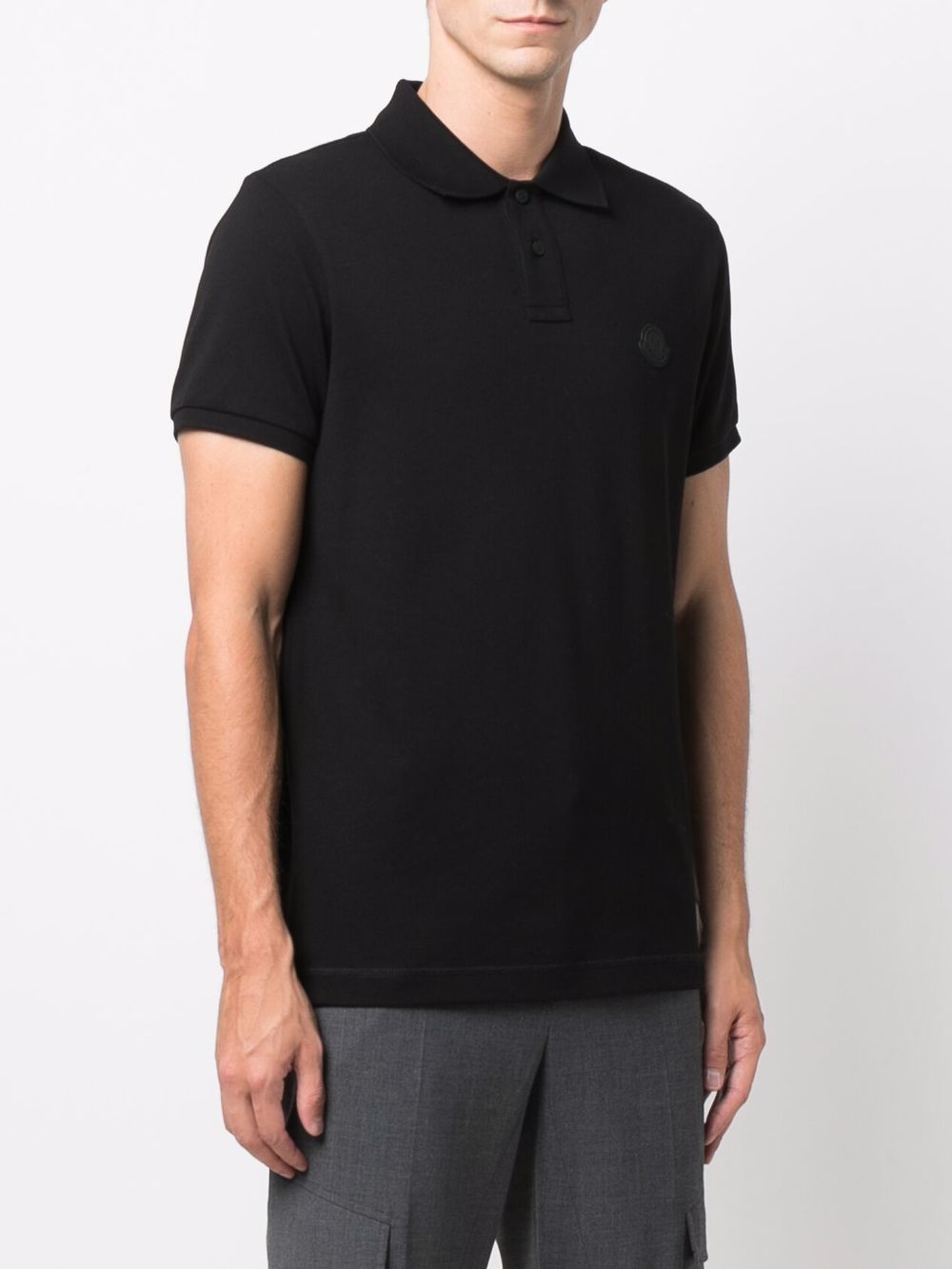 Polo con logo in nero 