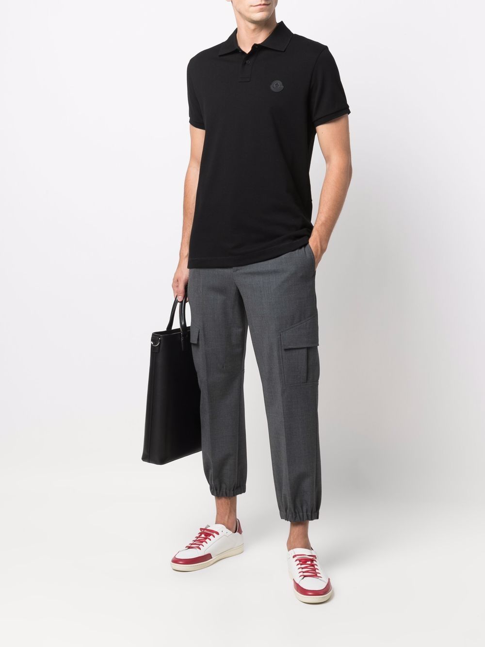 Polo con logo in nero 