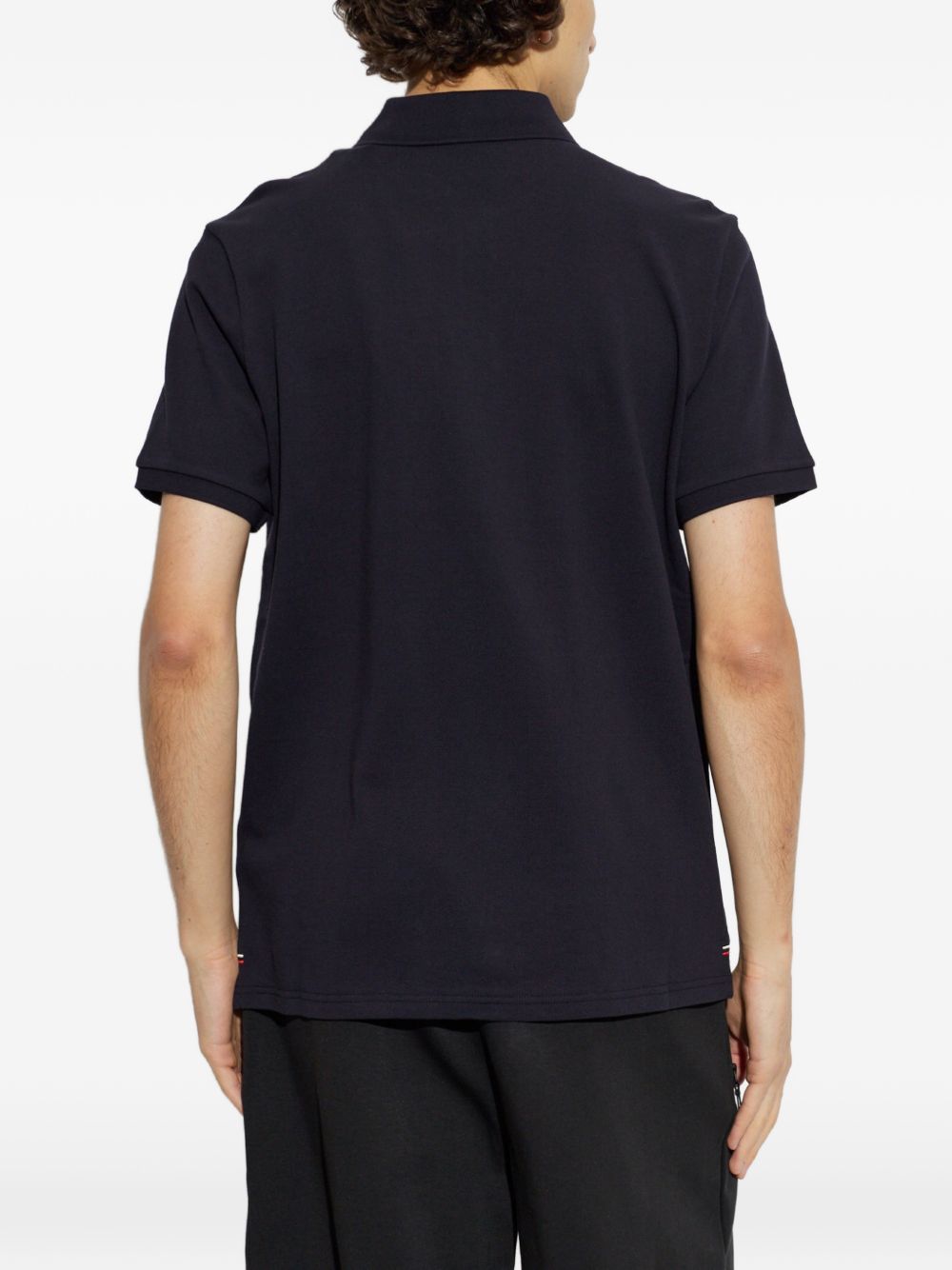 Polo con logo in blu 