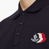 Polo con logo in blu 