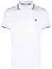 Polo con logo in bianco