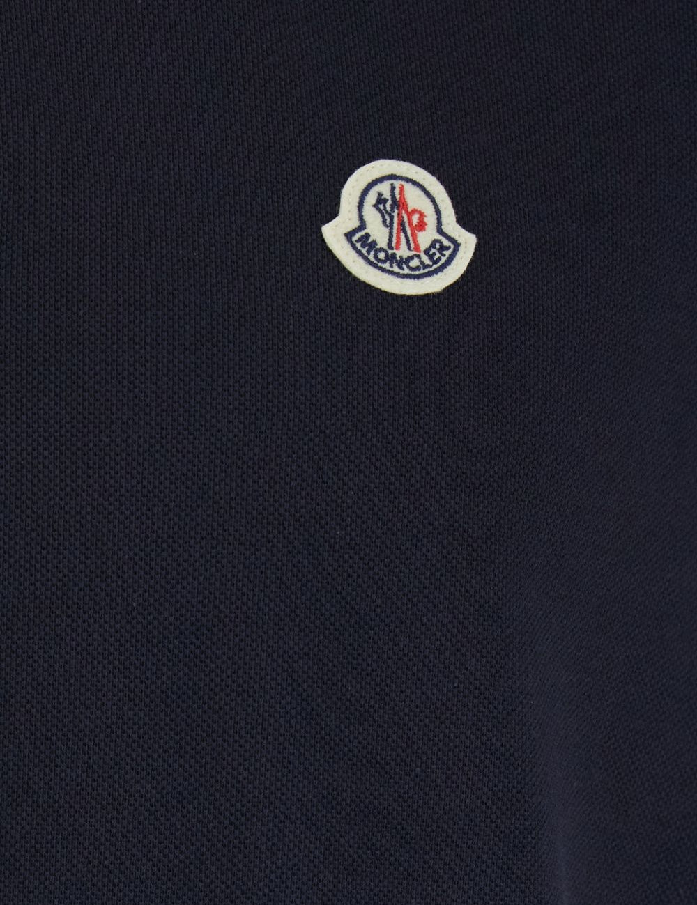 Polo con logo in blu 