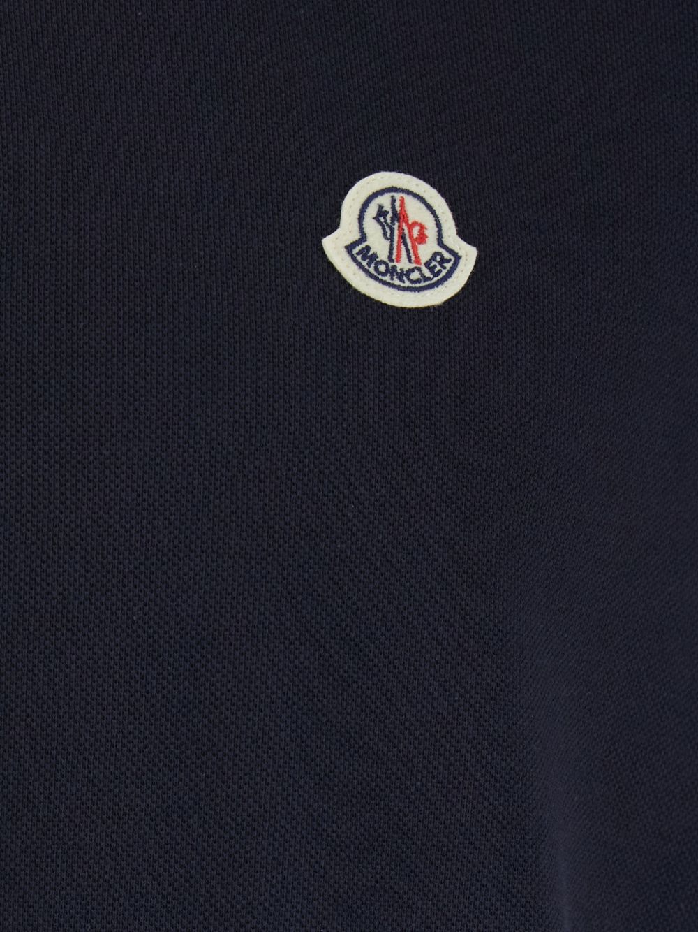 Polo con logo in blu 
