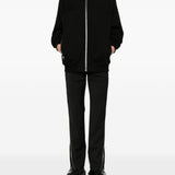 Pantaloni Vega con zip laterali in nero 