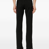 Pantaloni Vega con zip laterali in nero 