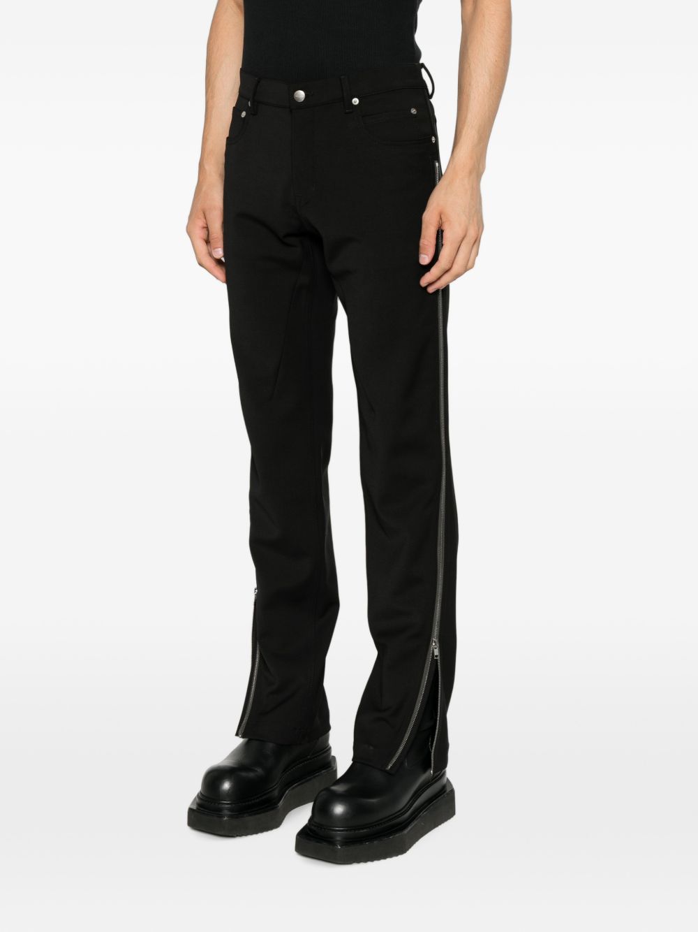 Pantaloni Vega con zip laterali in nero 