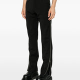 Pantaloni Vega con zip laterali in nero 