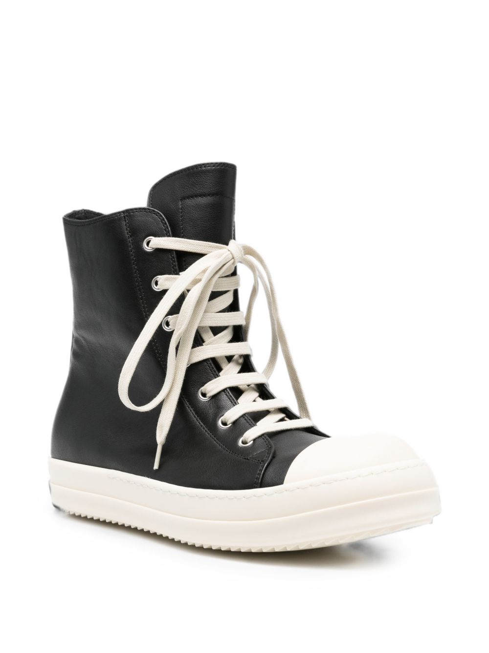 Sneakers alte in pelle in nero 