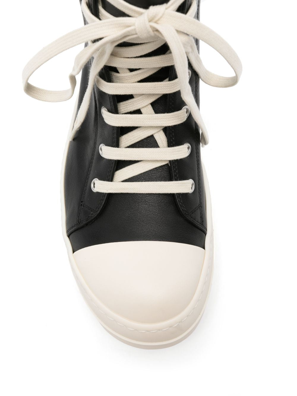 Sneakers alte in pelle in nero 