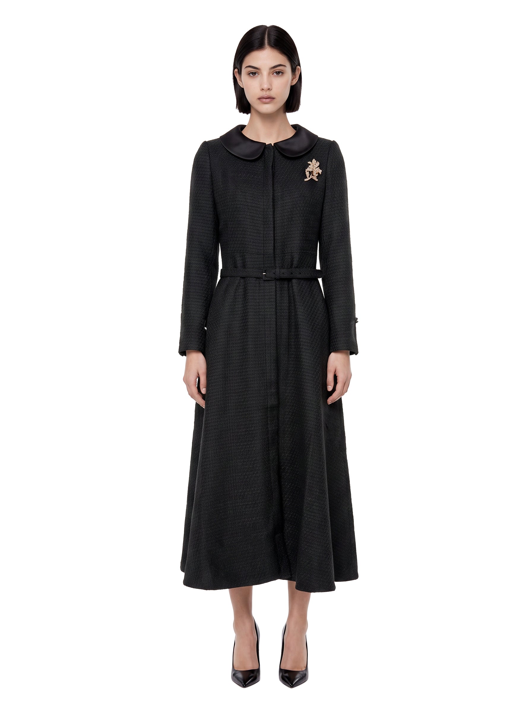 Cappotto bouclé con spilla nero 