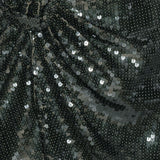 Abito corto con paillettes in verde 