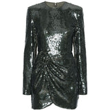 Abito corto con paillettes in verde 