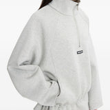 Felpa con mezza zip in grigio 
