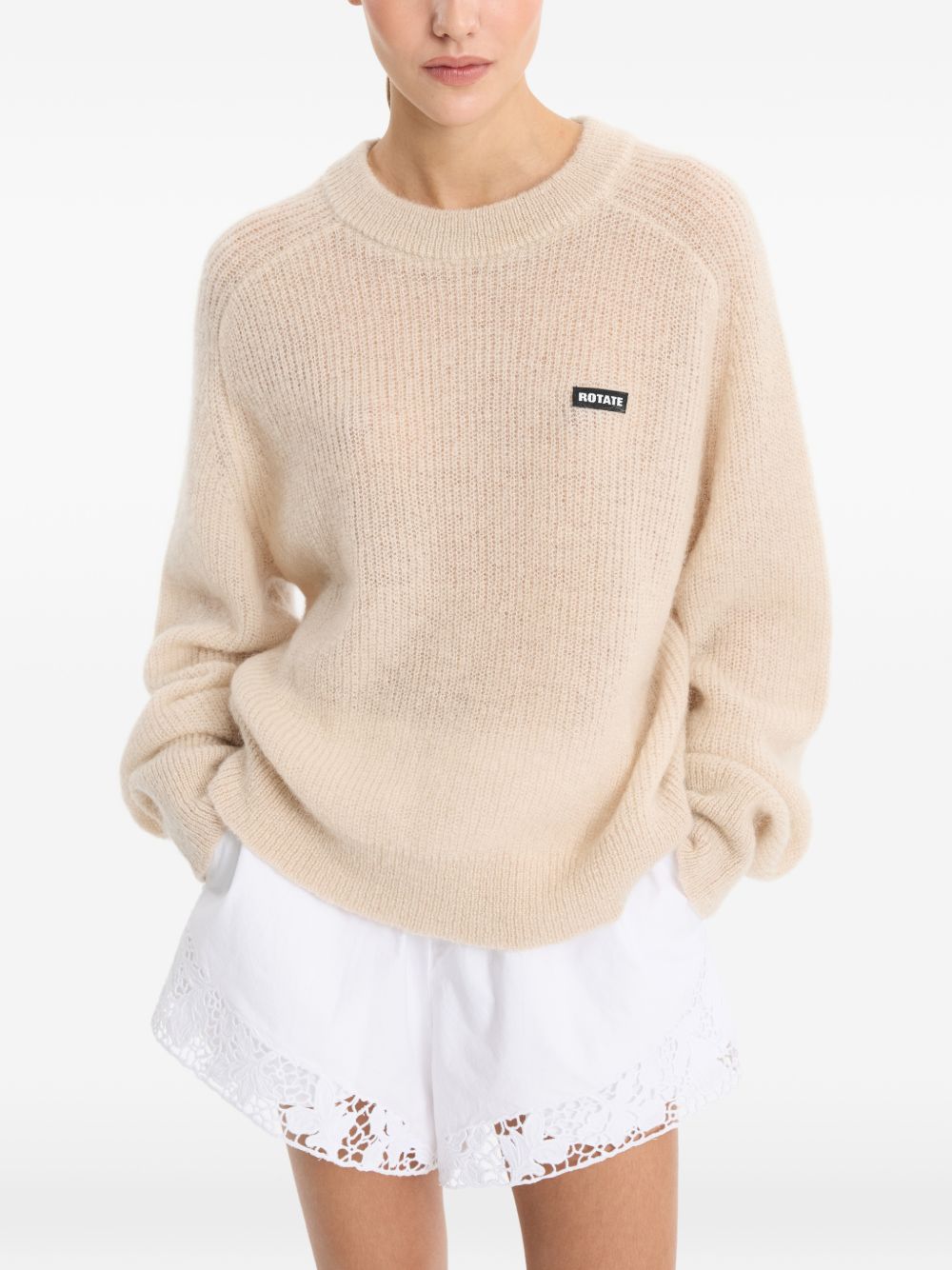 Shorts con orlo in pizzo bianco 