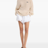 Shorts con orlo in pizzo bianco 