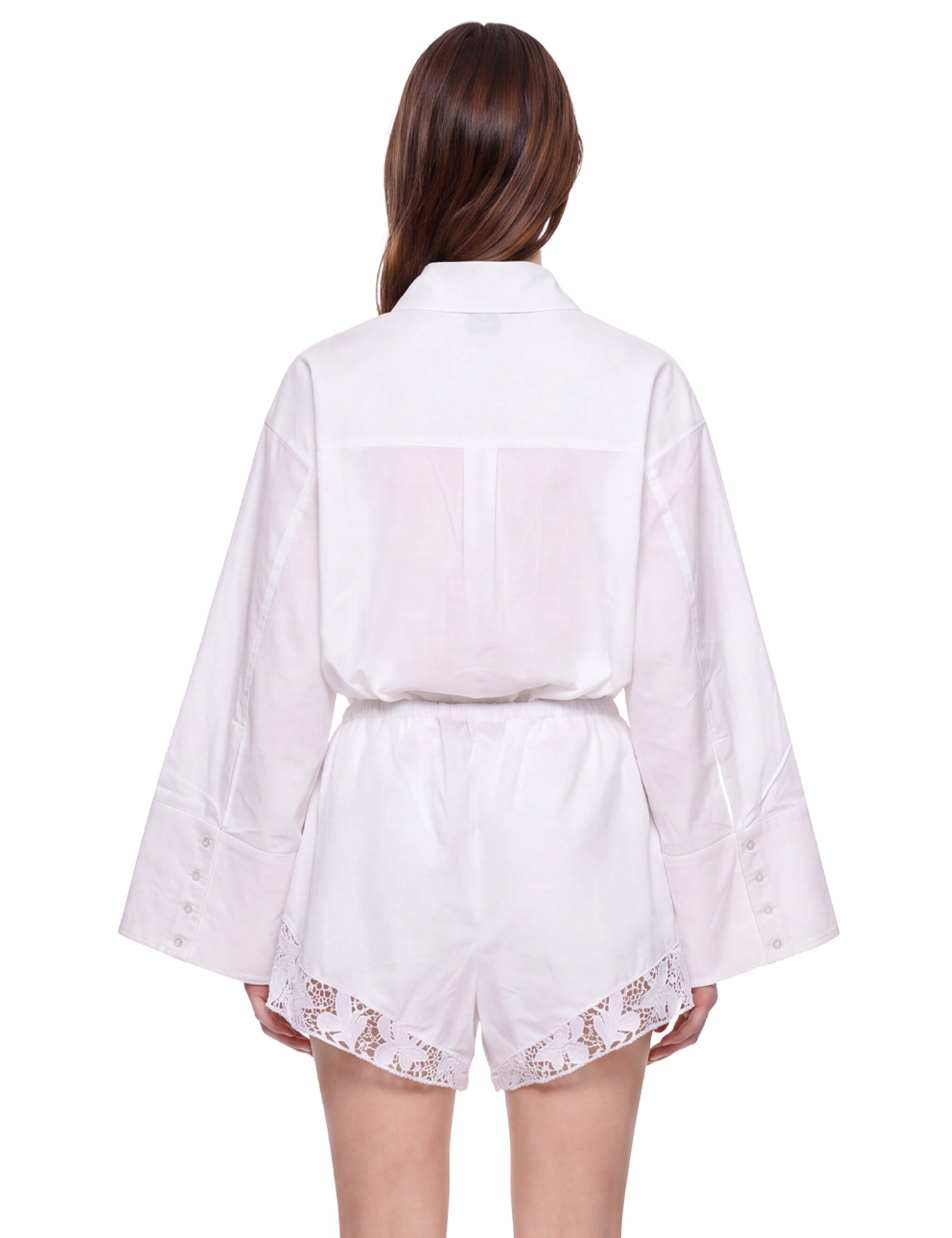 Shorts con orlo in pizzo bianco 