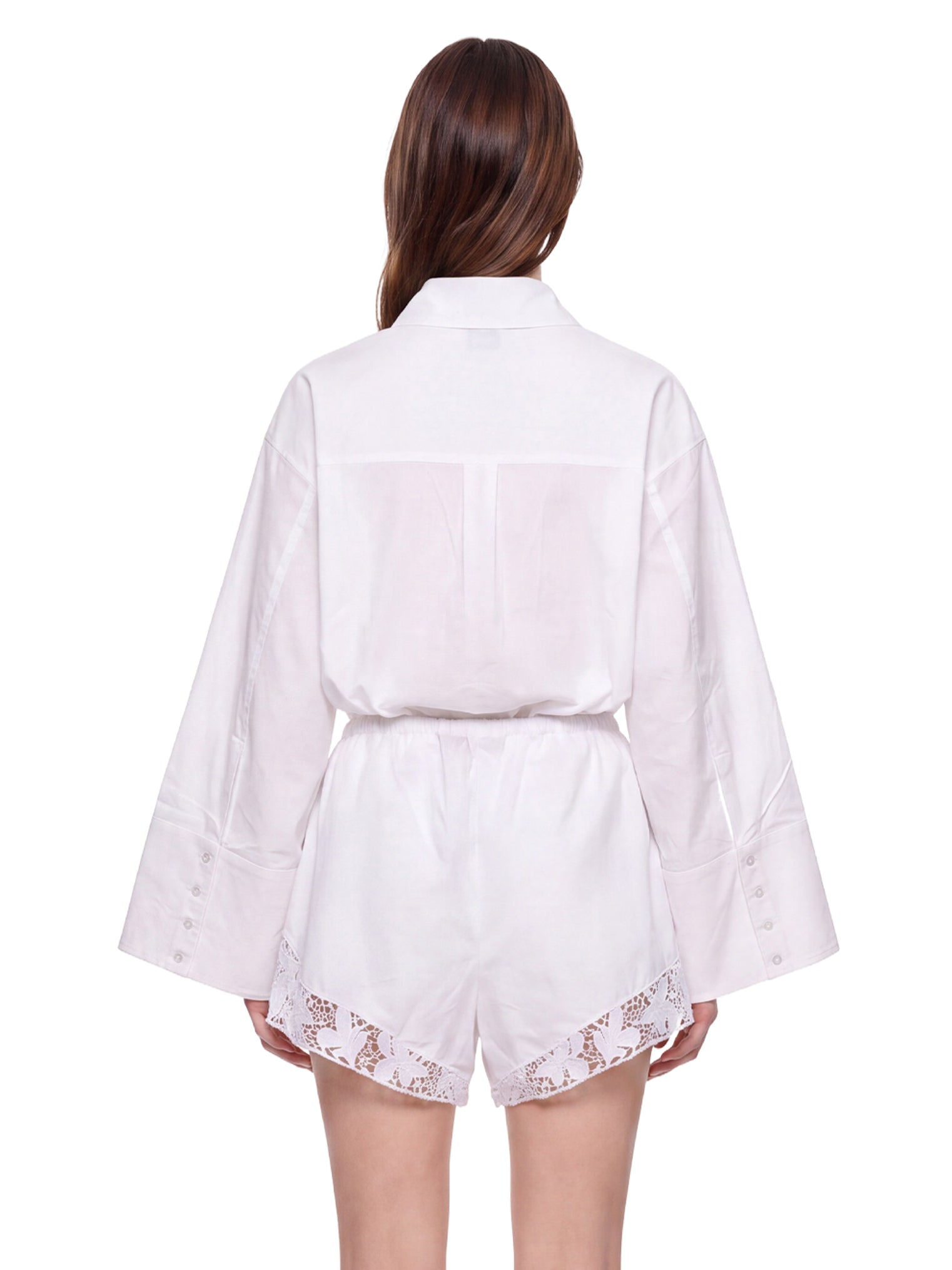 Shorts con orlo in pizzo bianco 