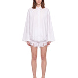 Shorts con orlo in pizzo bianco 