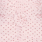 Abito con ruches a pois in rosa 