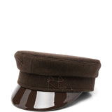 Cappello baker boy con tesa lucida in marrone 